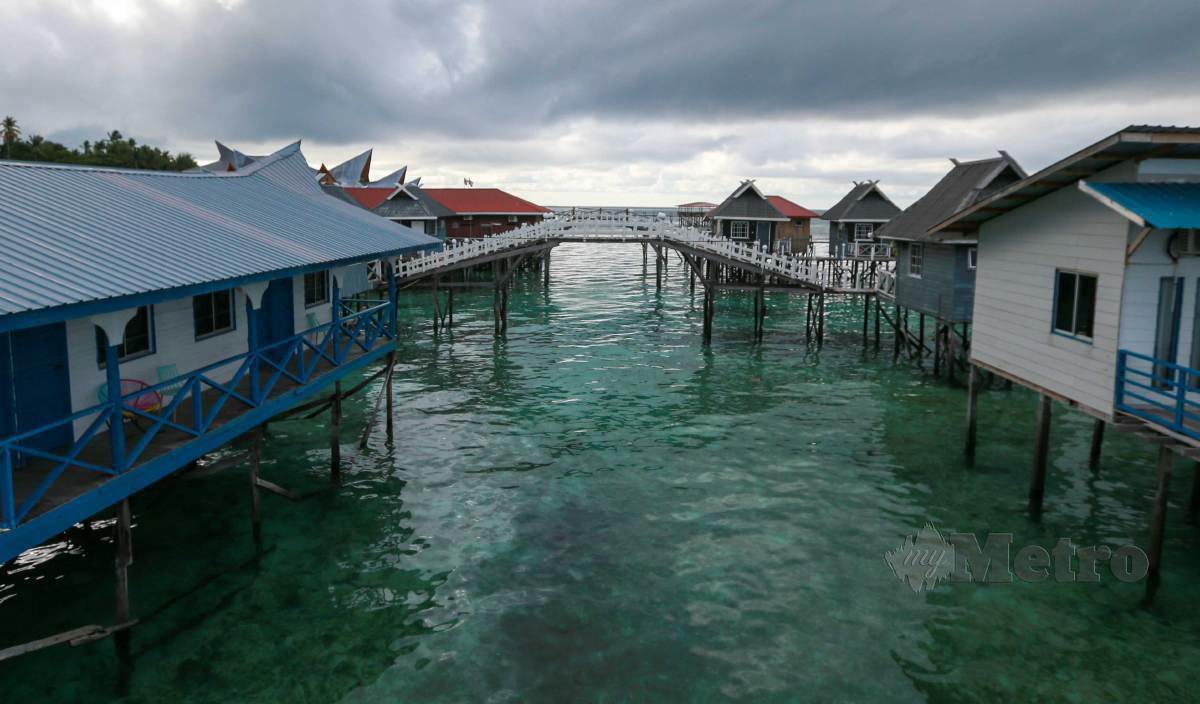 KEADAAN resort di Pulau Mabul lengang menyebabkan industri pelancongan yang menjadi nadi ekonomi utama terus lumpuh. FOTO Aswadi Alias