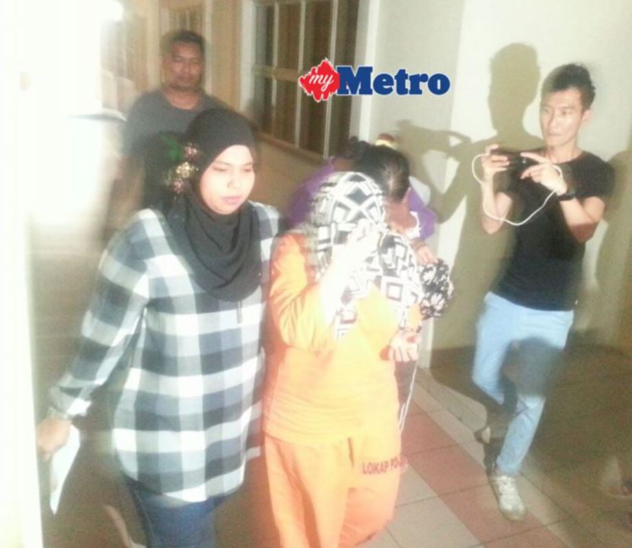 Wanita yang dipercayai terbabit dalam kes mendera pembantu rumah di Damansara, dalam kejadian semalam, ditahan malam tadi. FOTO Norizuan Shamsuddin.