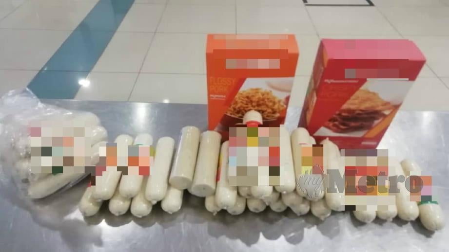 Produk berasaskan daging khinzir yang dirampas daripada seorang pelancong di Lapangan Terbang Antarabangsa Senai di Johor Bahru pada Jumaat lalu. Foto Ihsan MAQIS 