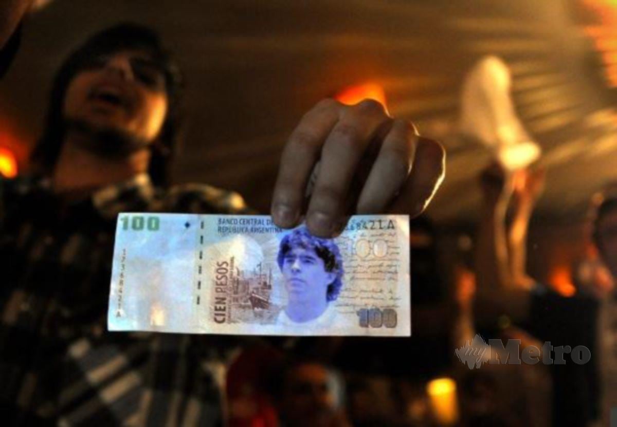 Wajah Maradona pada wang kertas Argentina. FOTO Agensi