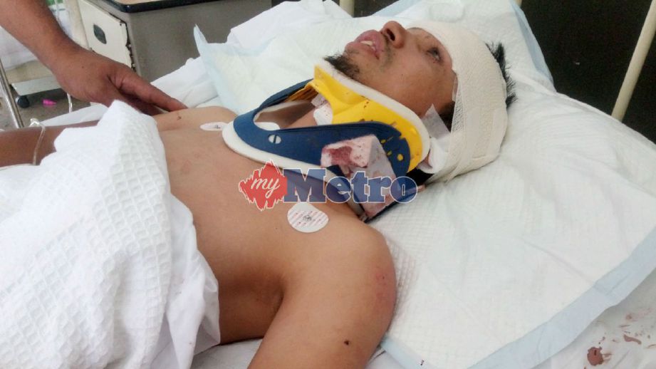 Amiruddin yang cedera di kiri kepala, tengkuk dan tangan mendapat rawatan di Hospital Tengku Ampuan Rahimah, Klang selepas dilanggar ketika menyertai Larian Klang City International Marathon di Jalan Kapar Batu 2, Klang. FOTO Faliq Lajim 