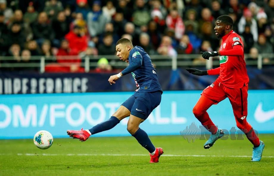 Kylian Mbappe menjaringkan gol kedua PSG. FOTO Reuters