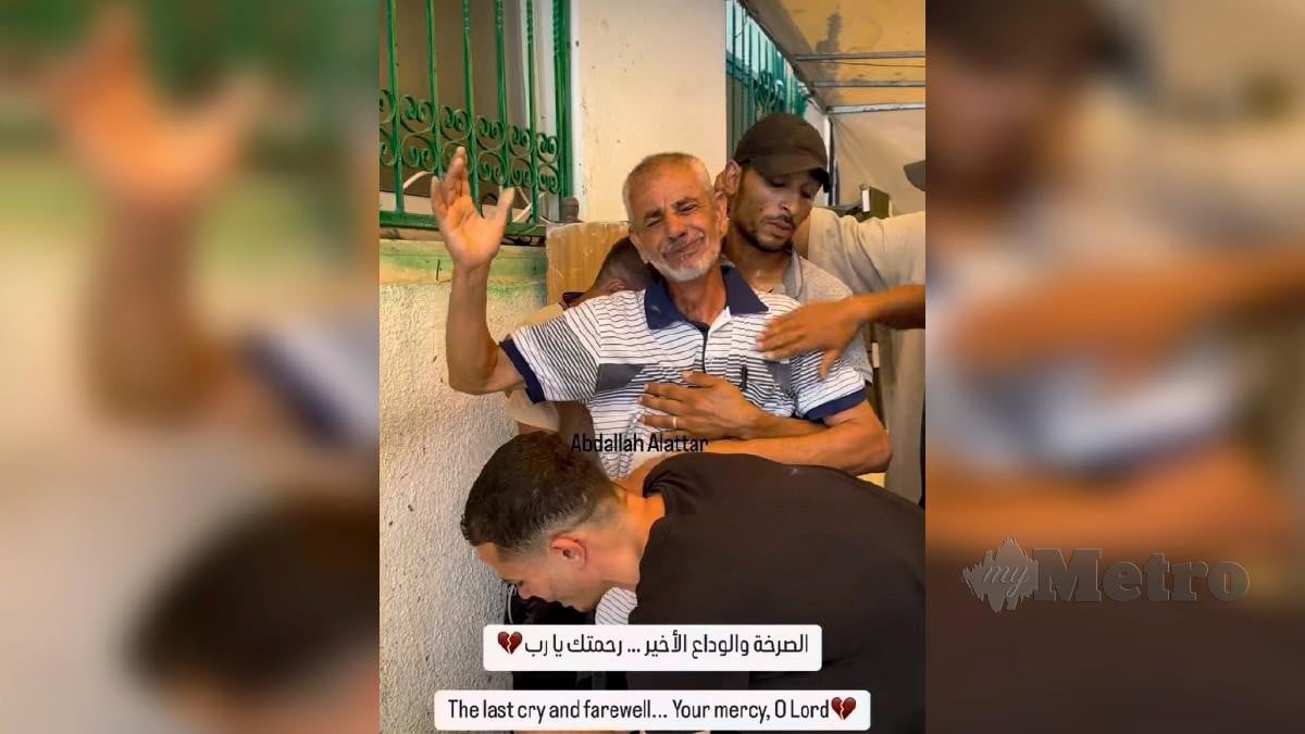 TANGKAP layar video seorang warga emas tidak dapat mengawal emosi ketika memberikan penghormatan terakhir terhadap anaknya yang terkorban dalam serangan Zionis. FOTO Abdallah Alattar