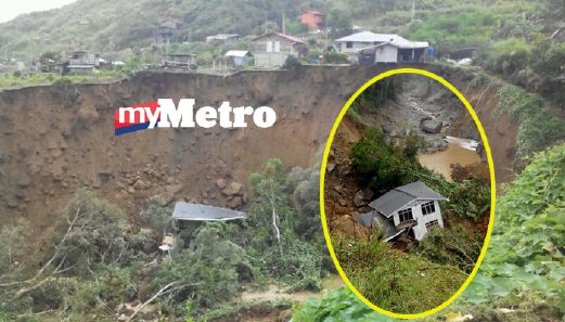  rumah dalam pembinaan yang hampir siap runtuh dan menggelongsor ke dalam sungai di Kampung Mesilau, Kundasang, pagi tadi. FOTO ihsan pembaca