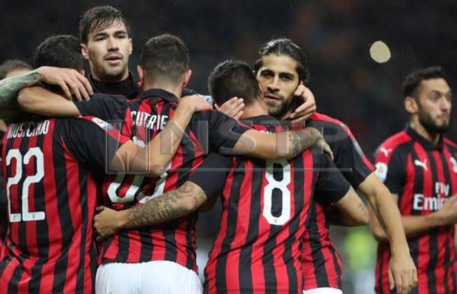 PEMAIN Milan meraikan kejayaan Romagnoli. FOTO/AFP 
