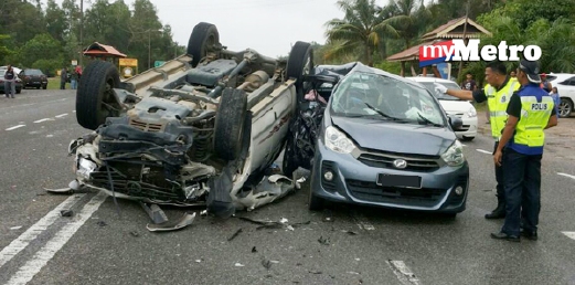 Penumpang MyVi terbunuh manakala pemandu dan seorang seorang lagi penumpang serta pemandu pilap cedera. - Foto ROSLI ILHAM
