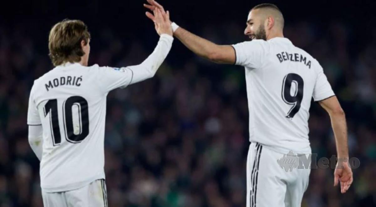 SKIL Modric dan ketajaman penyudah Benzema menjadi senjata berbisa Real Madrid dalam kempen Liga Juara-Juara Eropah musim ini. FOTO AGENSI
