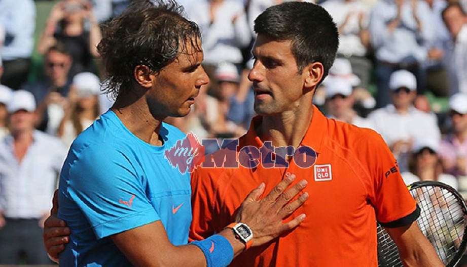 Rafael Nadal (kiri) akan bertemu seteru lamanya, Novak Djokovic pada aksi separuh akhir Terbuka Itali. FOTO AP