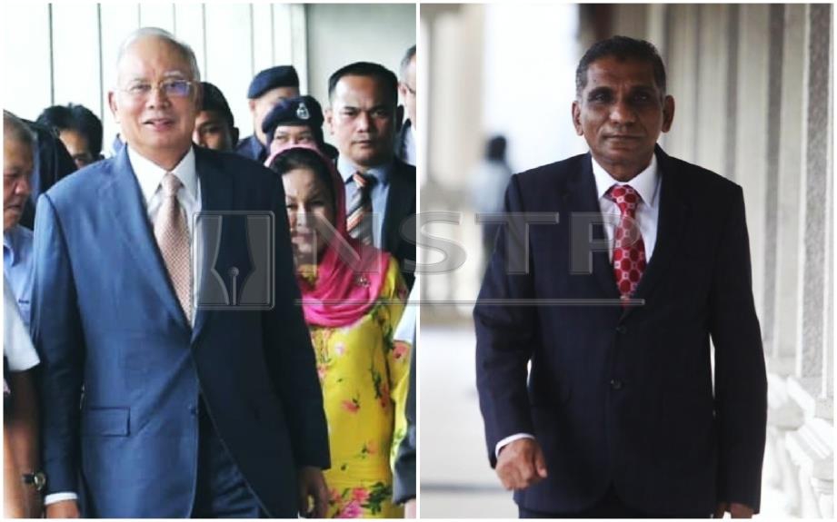 Najib (kiri) dan Irwan Serigar tiba di Kompleks Mahkamah Kuala Lumpur. FOTO Eizairi Shamsudin dan Syarafiq Abd Samad 