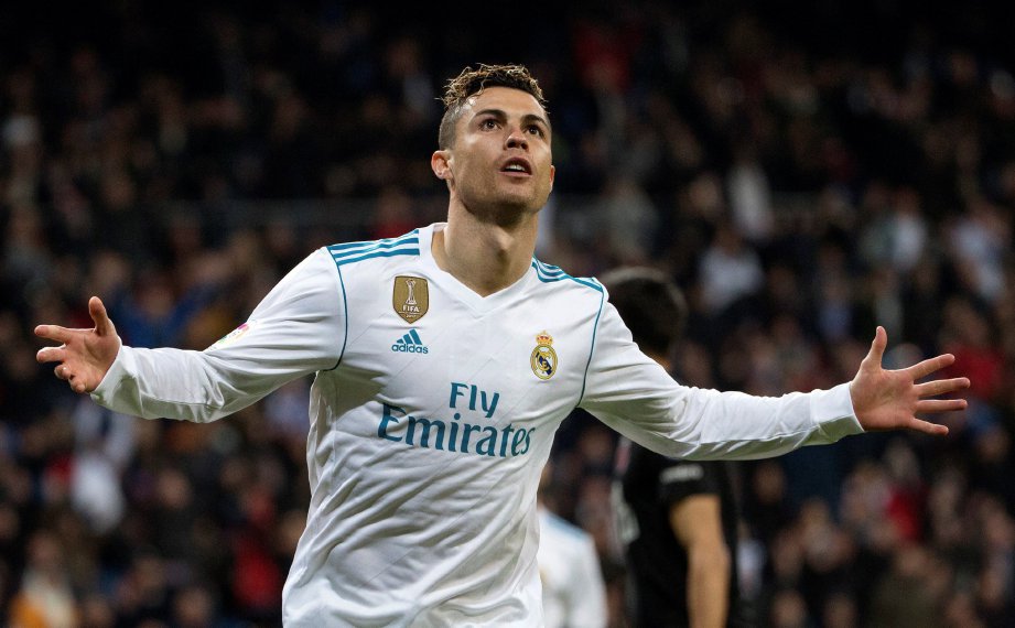 CRISTIANO Ronaldo meledak empat gol ketika Real menewaskan Girona, awal pagi tadi. - Foto EPA