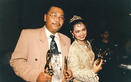 BERSAMA Siti ketika memenangi AJL ke-11 pada 1996 menerusi lagu Jerat Percintaan.