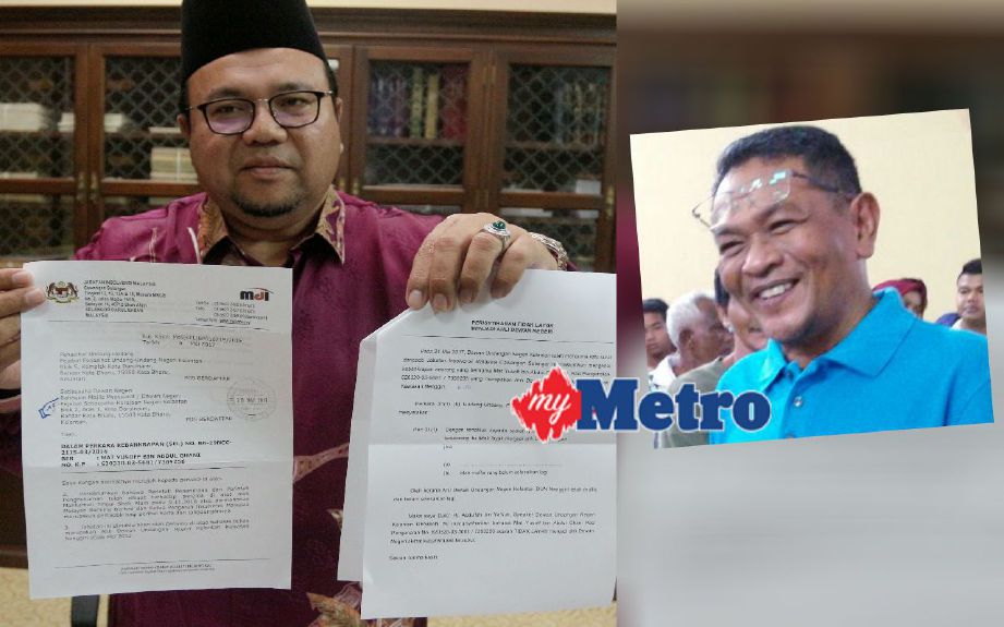 Abdullah menunjukkan Notis Kebangkrapan terhadap Mat Yusoff dari Jabatan Insolvensi Malaysia pada sidang media di Kota Darulnaim. FOTO Muhd Faris Zainuldin. (Gambar kecil)  Mat Yusoff