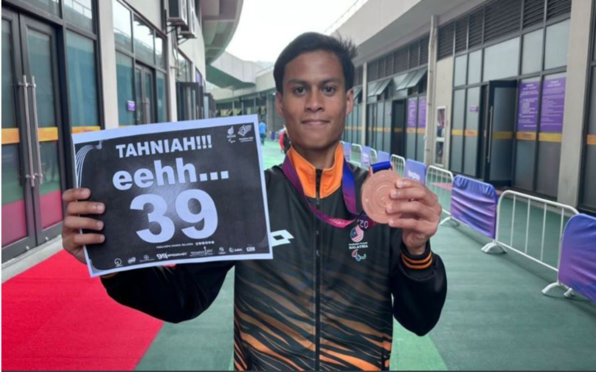 MUHAMAD Nurdin raih gangsa dalam acara 1500m. FOTO Majlis Paralimpik Malaysia