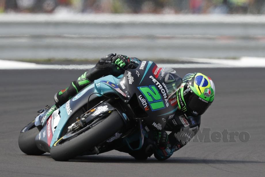 Petronas Yamaha SRT's Italian rider Franco Morbidelli rides his motorbike during the Moto GP race of the British Grand Prix at Silverstone circuit in Northamptonshire, central England, on August 25, 2019. (Photo by Adrian DENNIS / AFP)