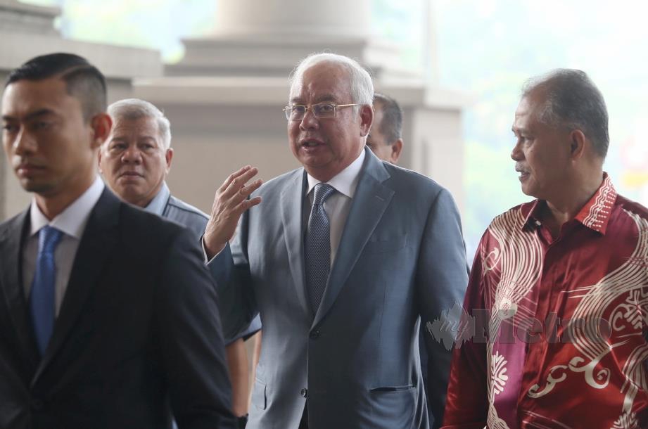 NAJIB hadir ke Mahkamah Tinggi Kuala Lumpur bagi perbicaraan kes rasuah dan pengubahan wang haram membabitkan dana 1MDB. FOTO Mohamad Shahril Badri Saali