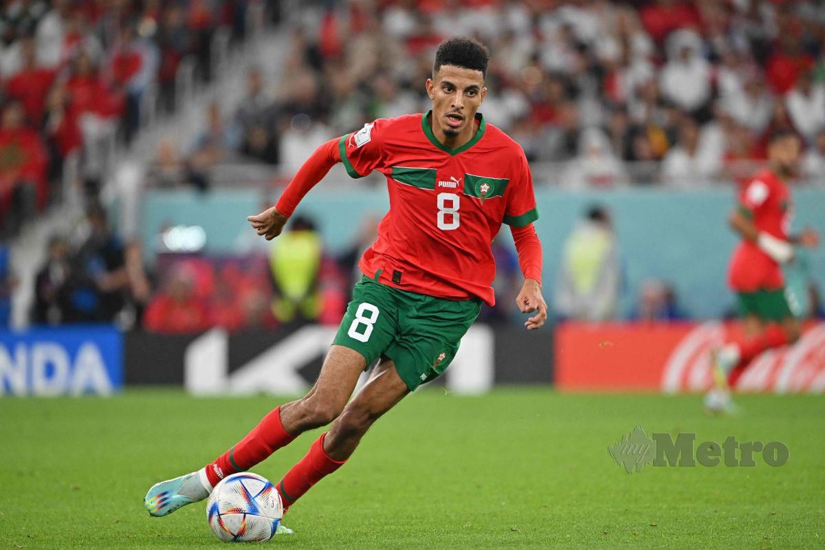 AKSI Ounahi ketika bertemu Portugal di Stadium Al-Thumama. FOTO AFP