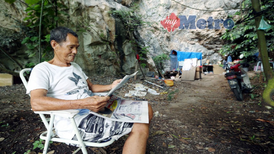 MUN King tinggal di celahan bukit di hadapan Sungai Keroh berhampiran Jalan Simpang Pulai-Lahat, Ipoh. FOTO Muhaizan Yahya
