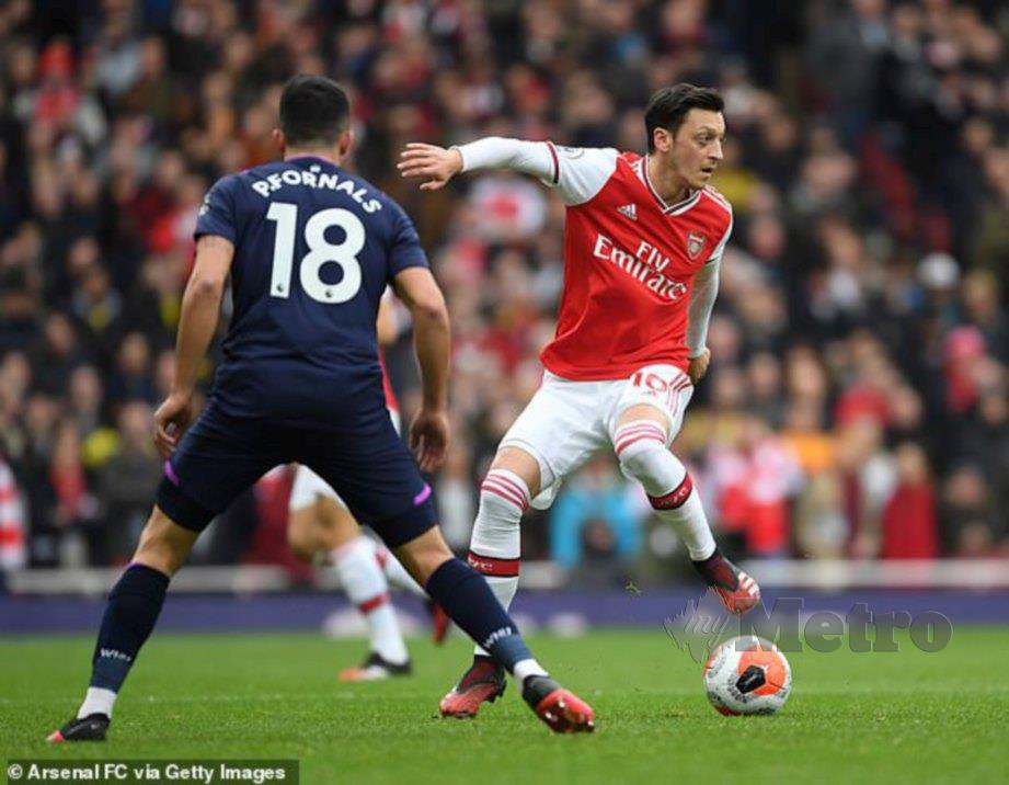 Aksi Ozil bersama Arsenal. FOTO File Agensi