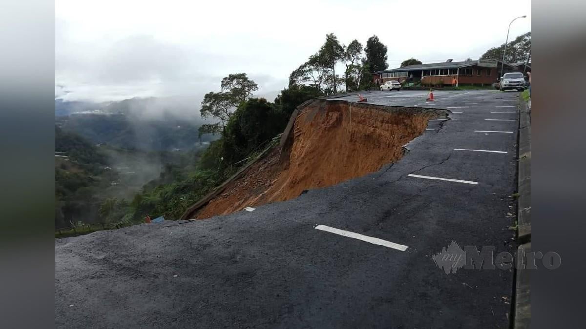 KAWASAN parkir Taman Negara Gunung Kinabalu yang runtuh kira-kira jam 1 pagi, hari ini. FOTO ihsan JKR