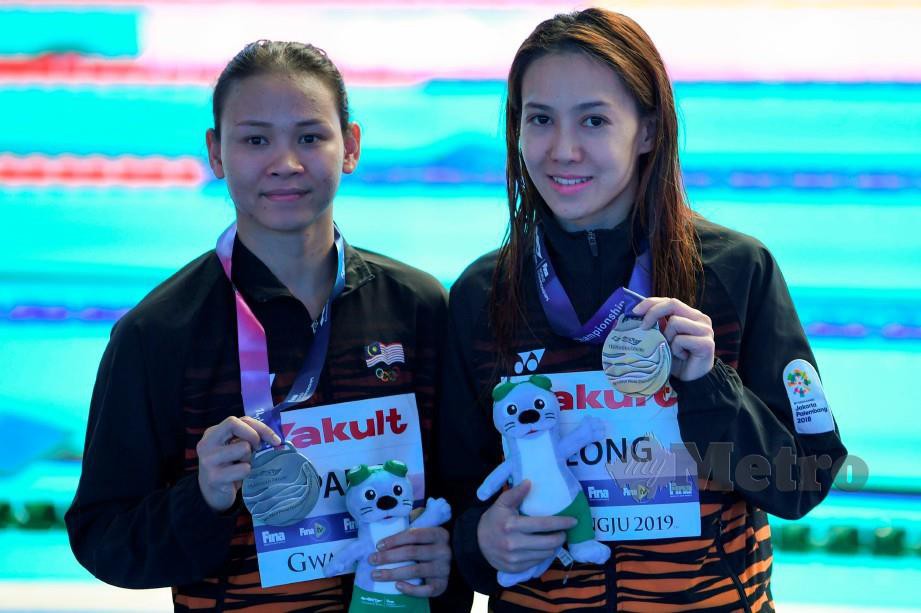 PANDELELA (kiri) dan Mun Yee sumbang pingat tunggal negara pada Kejohanan Akuatik Dunia di Gwangju. — FOTO AFP