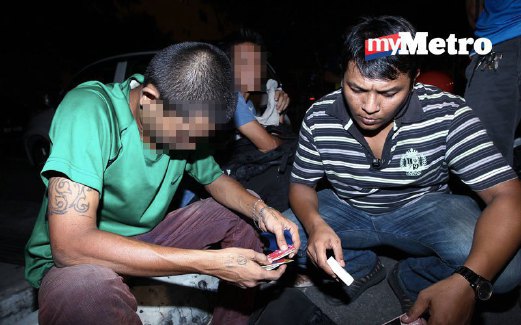 ANTARA individu yang ditahan ketika Ops Penjaga Parkir Haram di sekitar Kuala Lumpur yang berakhir pagi semalam. 