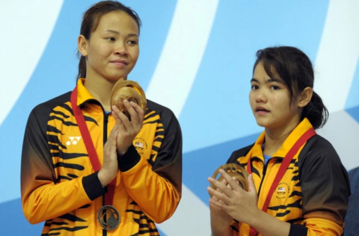 PANDELELA (kiri) kini gigih menjalani latihan bagi menghadapi Sukan Asia Hangzhou.