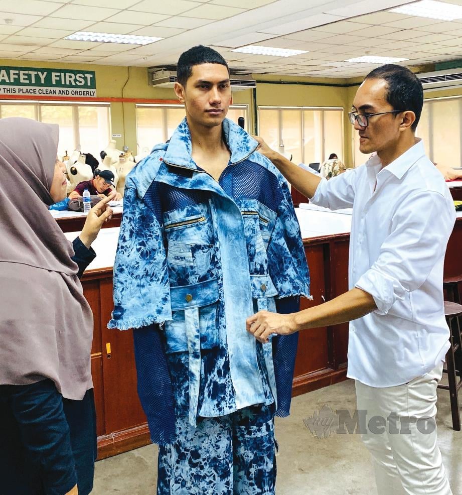MELAHIRKAN golongan muda yang mempunyai ilmu mengenai fesyen menjadi minat Faizal berbanding mempunyai jenama sendiri. FOTO: Rohanis dan ihsan Faizal Hamid