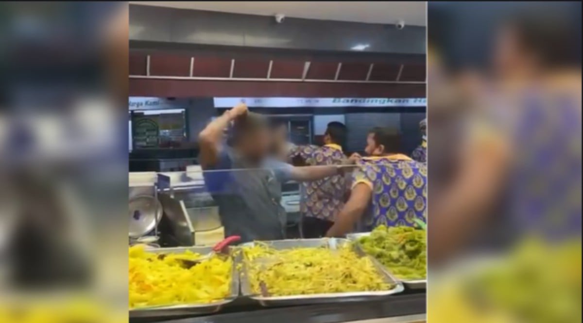 TANGKAP layar video tular menunjukkan pekerja restoran Pelita dipukul.