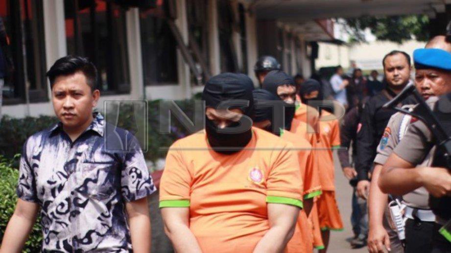 ANTARA suspek kes bunuh yang ditahan polis Indonesia. -Foto Tribun News