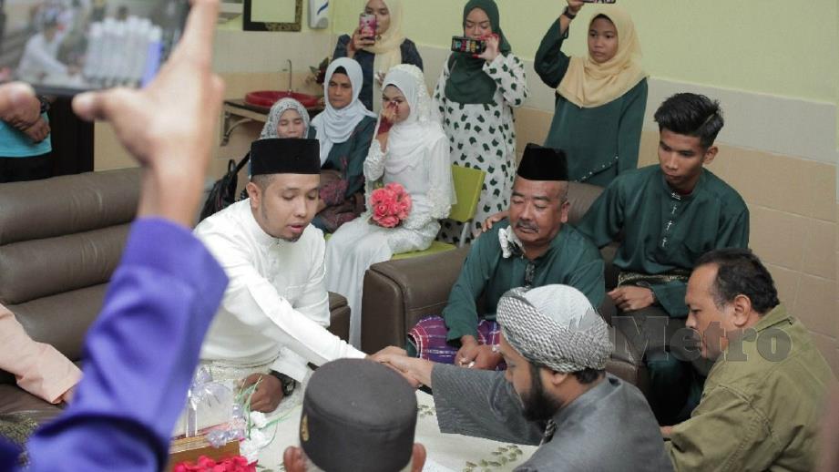 UPACARA pernikahan Ahmad Riduan dan Nurul Ain di HTJ. FOTO Ihsan Nurul Ain 