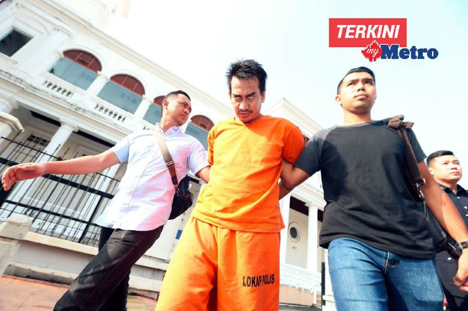 Pengawal peribadi berusia 37 tahun didakwa di tiga mahkamah berasingan di Georgetown, Pulau Pinang hari ini terhadap sembilan tuduhan. FOTO Mikail Ong