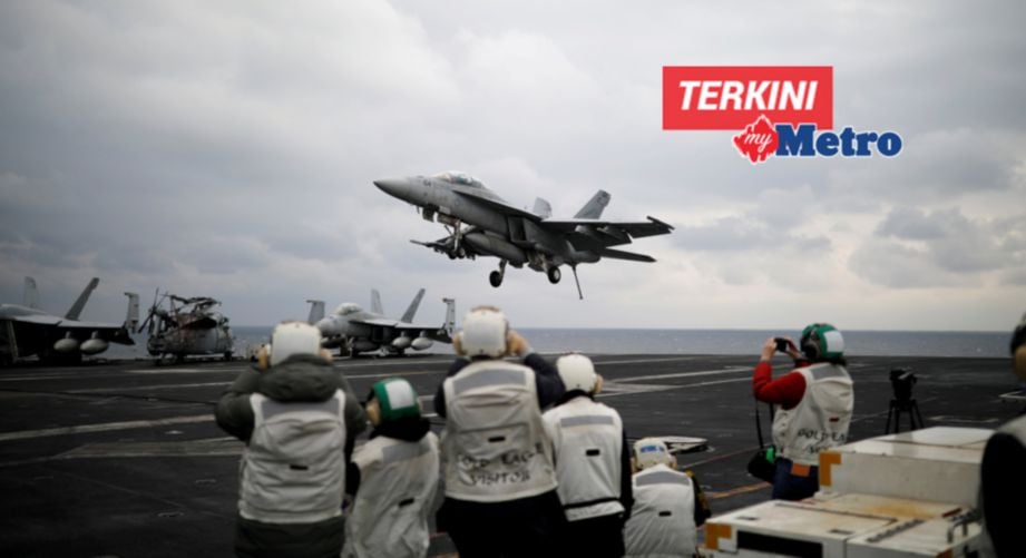 Gambar fail menunjukkan jet pejuang Amerika, F18 di atas dek kapal USS Carl Vinson pada latihan bersama Korea Selatan dipanggil ‘Foal Eagle’ di laut Korea Selatan, pada 14 Mac. FOTO Reuters 