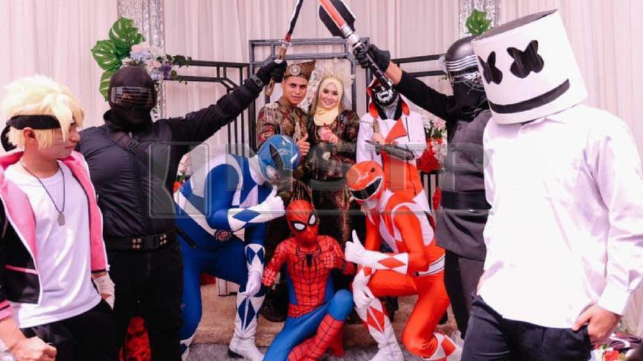 RAKAN Alif Hakim yang hadir dengan mengenakan kostum pelbagai watak adiwira, termasuk Spiderman, Power Rangers, Naruto dan beberapa watak dalam filem Star Wars. FOTO Ihsan Alif Hakim