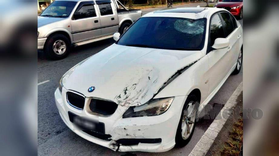 PEMANDU kereta BMW yang didaftarkan atas nama sebuah syarikta diburu polis kerana terbabit dengan kejadian langgar lari. FOTO Ihsan Polis