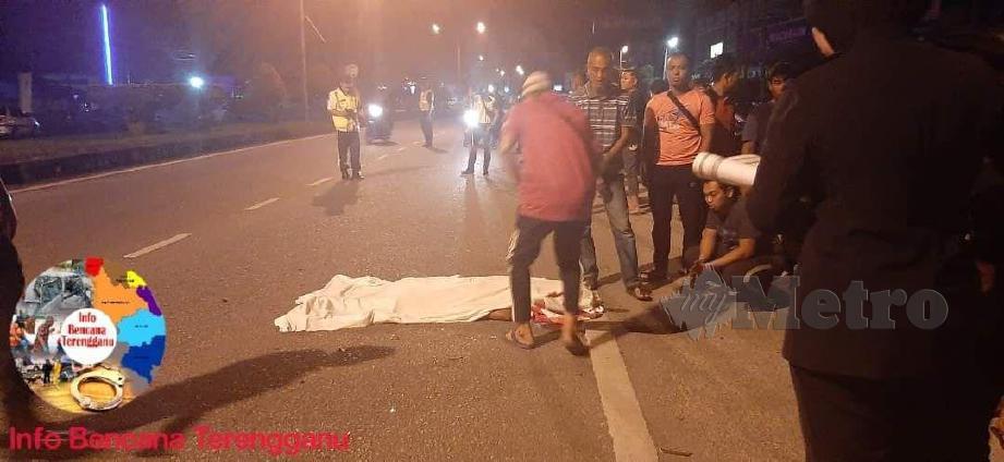 Mayat mangsa yang terbabit dalam kemalangan  berhadapan Kem Askar Rejimen 512, Padang Midin, Kuala Terengganu. FOTO IHSAN INFO BENCANA TERENGGANU