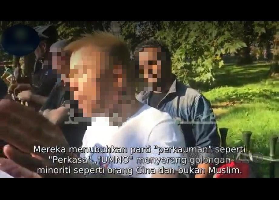 PAPARAN video dipercayai lelaki rakyat Malaysia di United Kingdom yang menghina agama Islam, raja dan negara. FOTO Tular