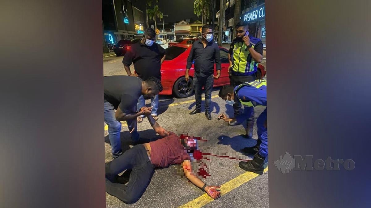 LELAKI cedera di kepala selepas terbabit dalam pergaduhan di Jalan Telawi, Bangsar. FOTO Hairul Anuar