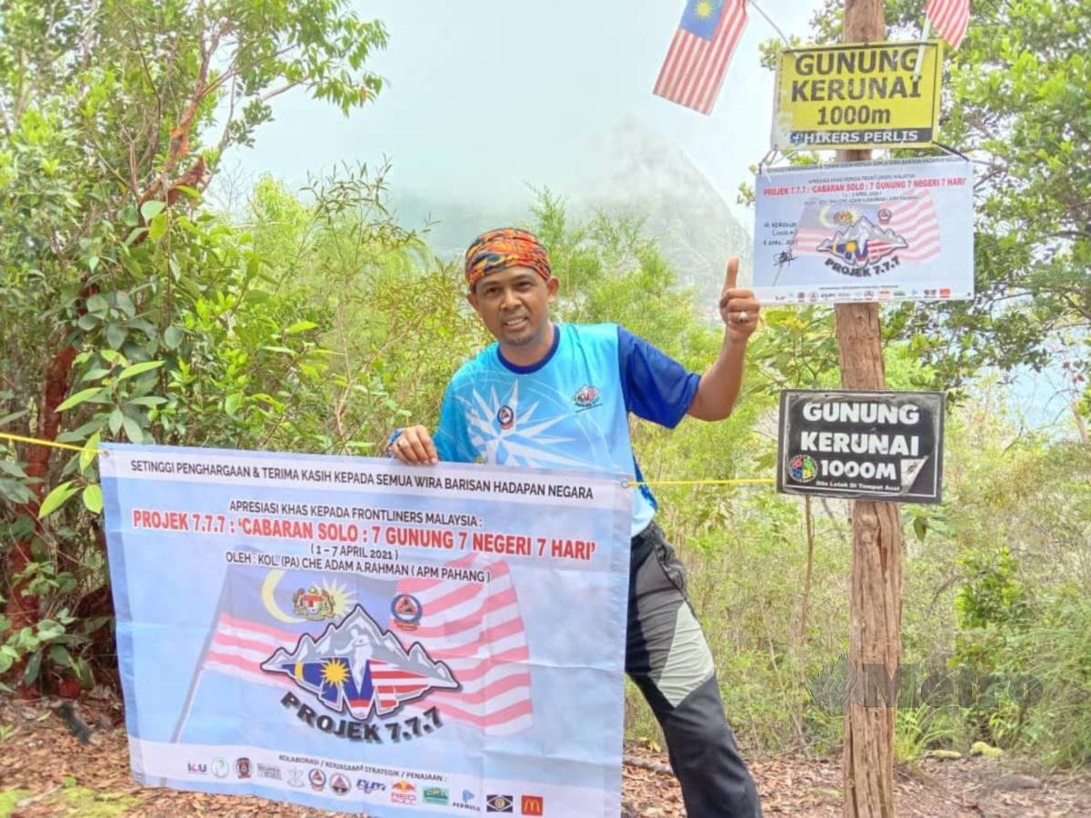 Che Adam A Rahman menawan Gunung Kerunai, Perak dalam misi pendakian tujuh gunung di tujuh negeri dalam tempoh tujuh hari. FOTO IHSAN APM