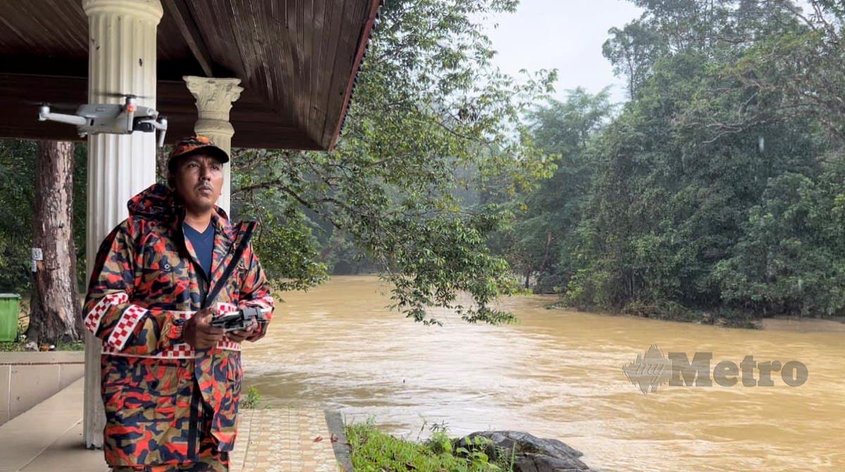 Keadaan air sungai yang diambil menggunakan dron di Kampung Pasir Raja. FOTO ZATUL IFFAH ZOLKIPLY