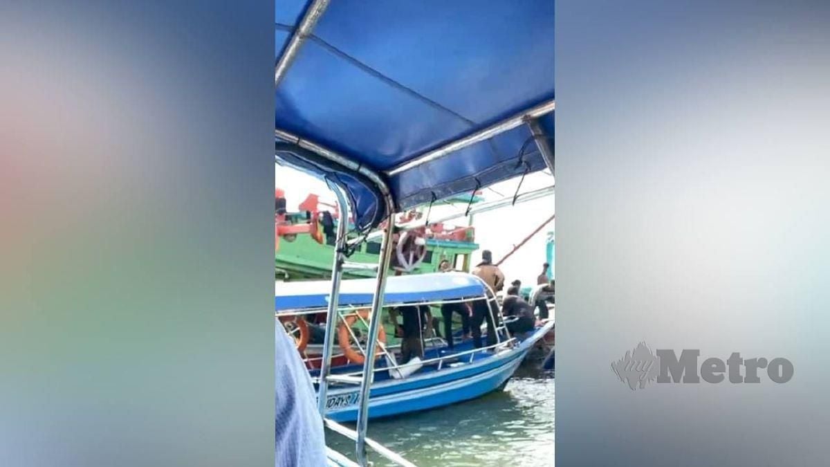 KEADAAN di Jeti Pelancongan Kuala Besut selepas insiden bot pelancong bertembung bot nelayan. FOTO Ihsan Pembaca