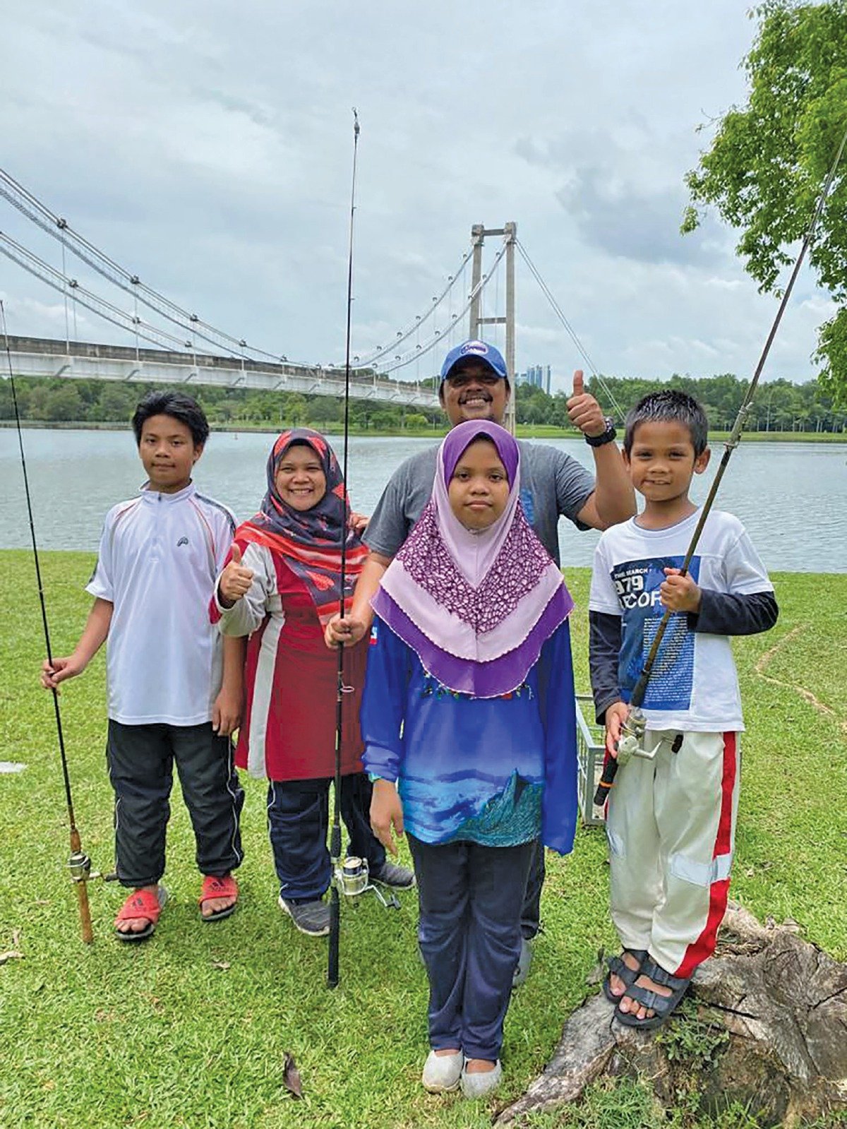 NORIZAN sekeluarga hadir memeriahkan aktiviti sepanjang pertandingan memancing.