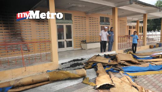 Permaidani dalam stor yang terbakar. FOTO Amran Yahya