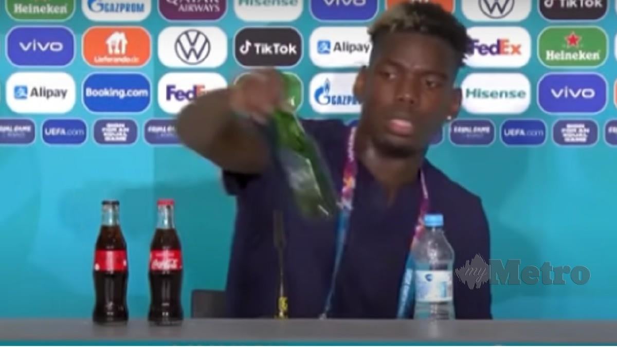 POGBA mengalih botol arak pada sidang media di Euro 2020. FOTO AFP