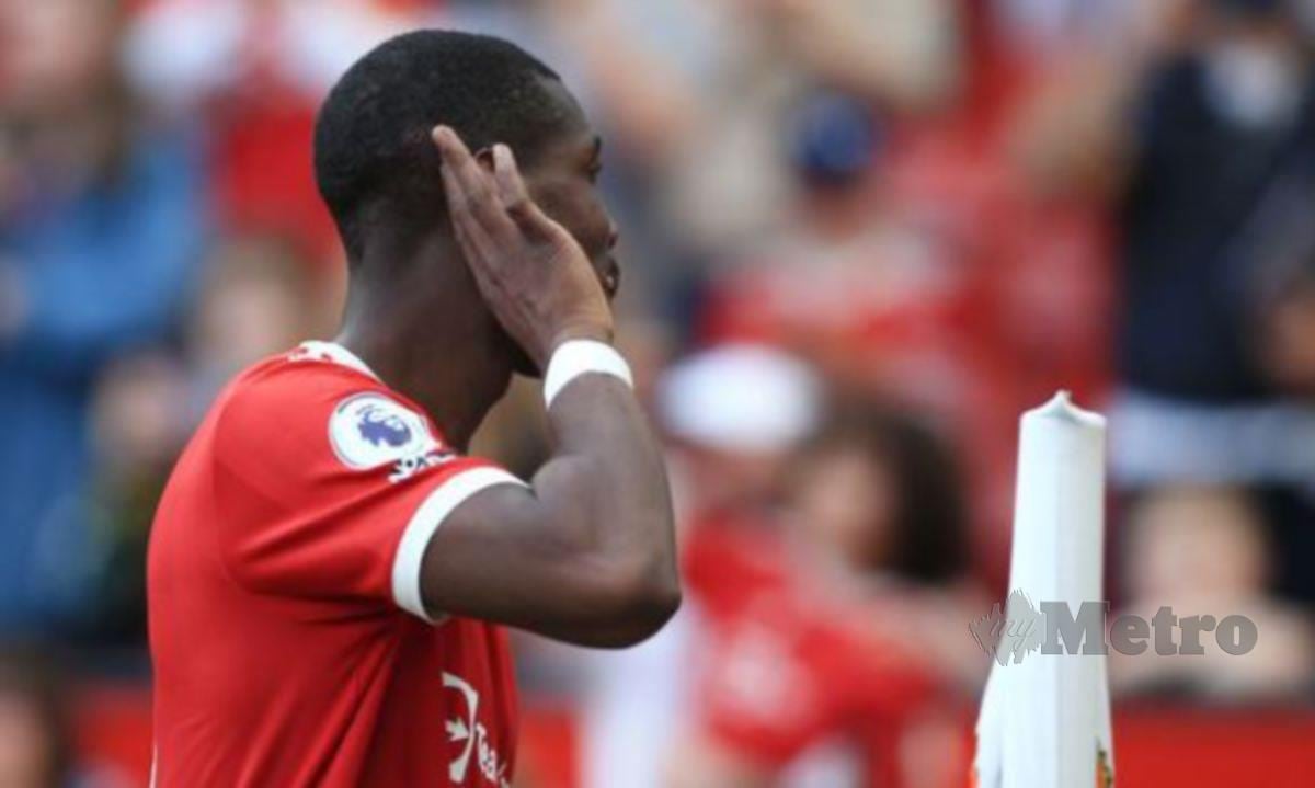 REAKSI Paul Pogba ketika diejek penyokong Manchester United ketika menang 3-2 ke atas Norwich, awal bulan ini. FOTO Agensi 