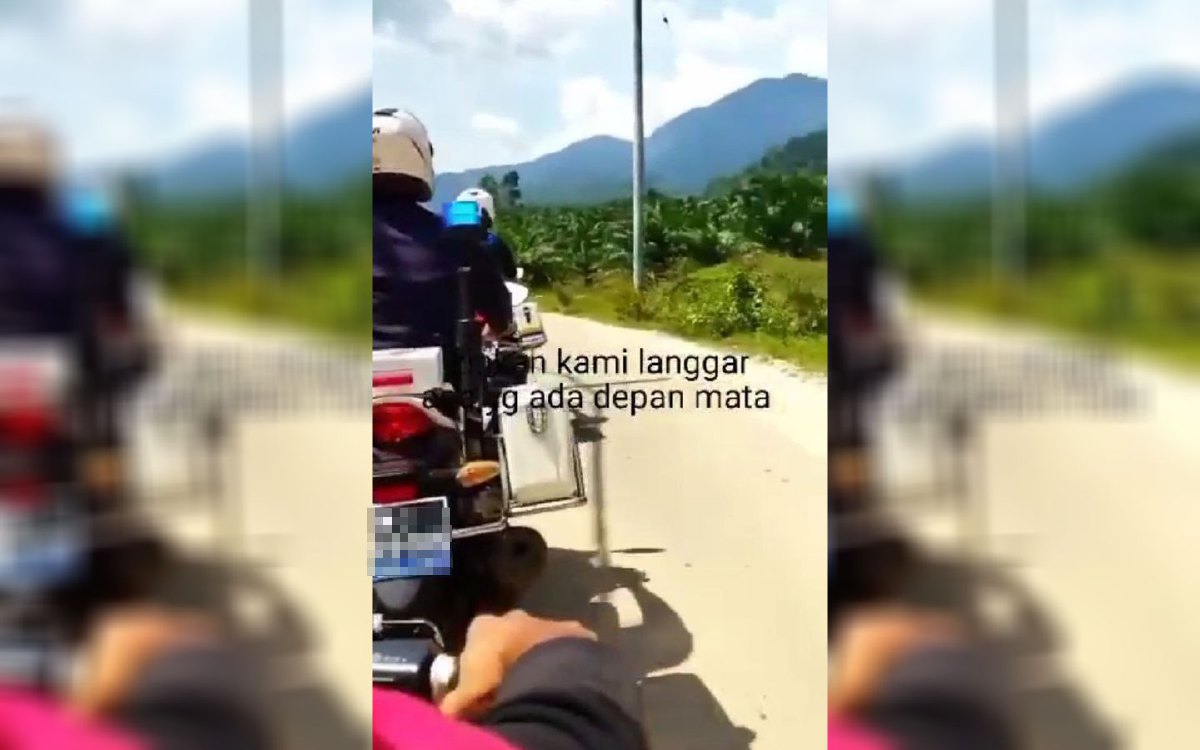 Tangkap layar video tular di TikTok memaparkan detik orang awam terlanggar anggota polis URB. FOTO VIDEO TULAR
