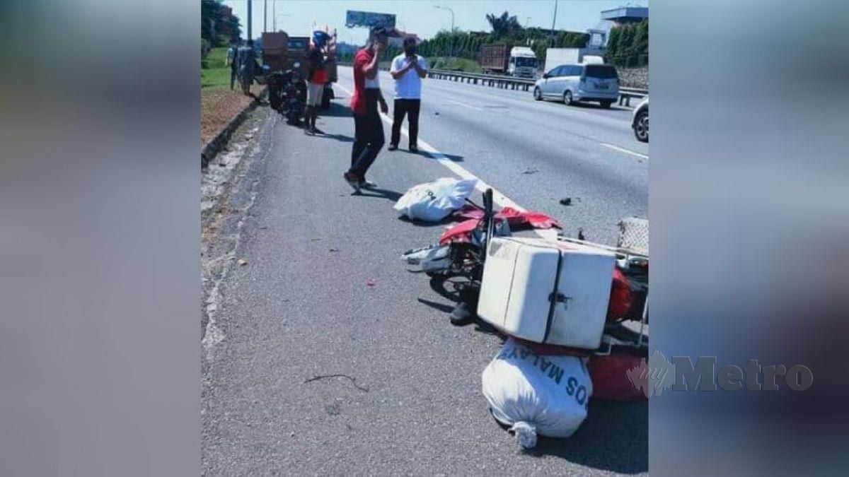 KEADAAN motosikal posmen yang maut dalam kemalangan di Kilometer 301.1 Lebuh Raya KL - Seremban arah utara, semalam. FOTO ihsan FB Bandar Baru Bangi Online Community