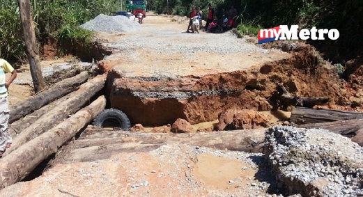 Keadaan jalan yang menghubungkan perkampungan Orang Asli Kampung Bawong ke Pos Poi yang terputus. - Foto Ihsan Bomba
