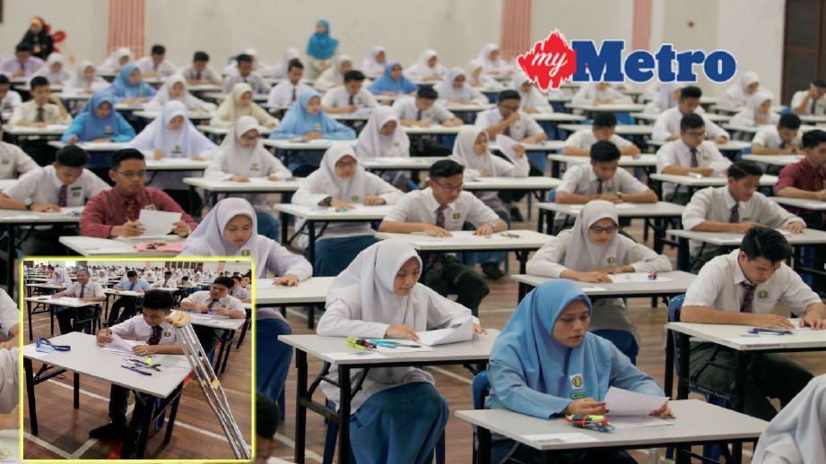 Sebahagian daripada 167 calon SPM menjawab soalan Kertas Bahasa Melayu 1 di Sekolah Menengah Kebangsaan Putrajaya Presint 16 (1), hari ini. Gambar kecil, Muhammad Faisal Rusydan. Foto NURSYAHIRAH MARZUKI