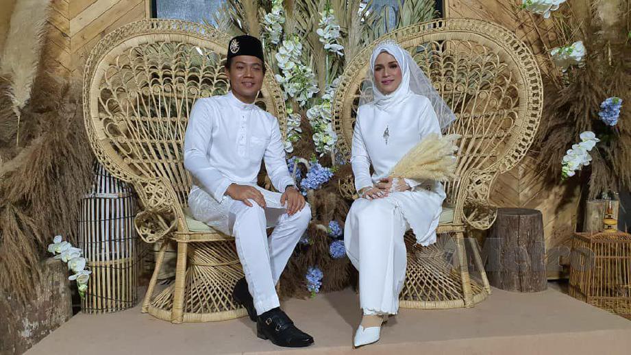  QODY dengan pasangan, Nurul Atiqah bersanding di Dewan Long Jiwa, Kampung Kumpulan, Langkawi. FOTO Hamzah Osman