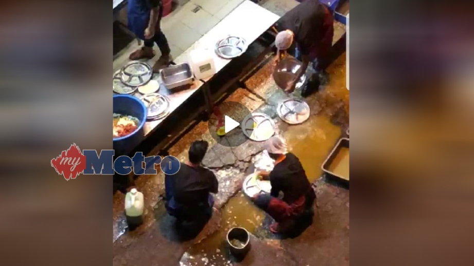 RAKAMAN video pekerja mencuci pinggan dengan air lopak tular di media sosial.